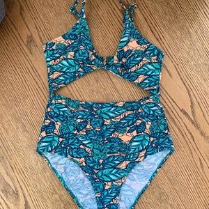 One piece bathing suit with tie at front